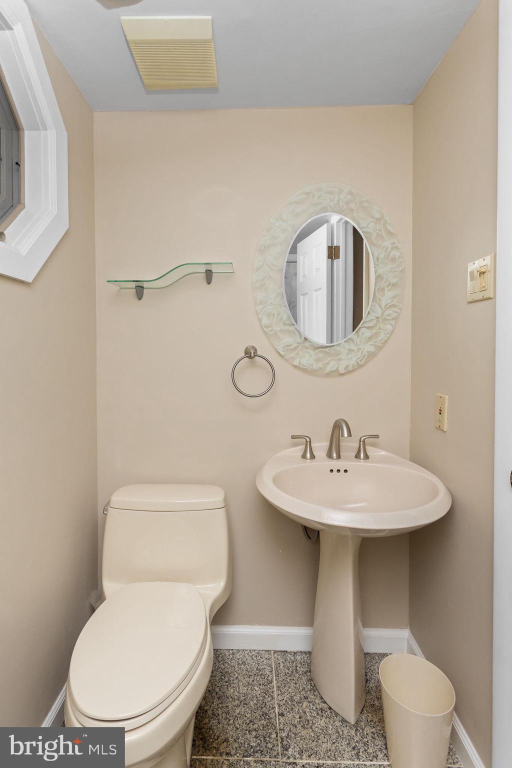 420 Extonville Road Allentown, NJ 08501 - Photo 38 of 57 a white toilet sitting next to a bathroom sink