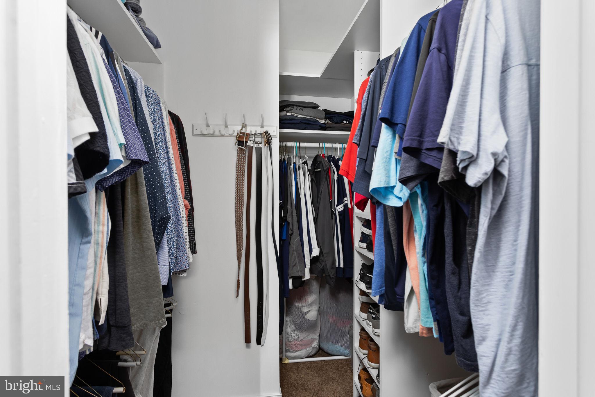 420 Extonville Road Allentown, NJ 08501 - Photo 48 of 57 a view of walk in closet with clothes and shoes