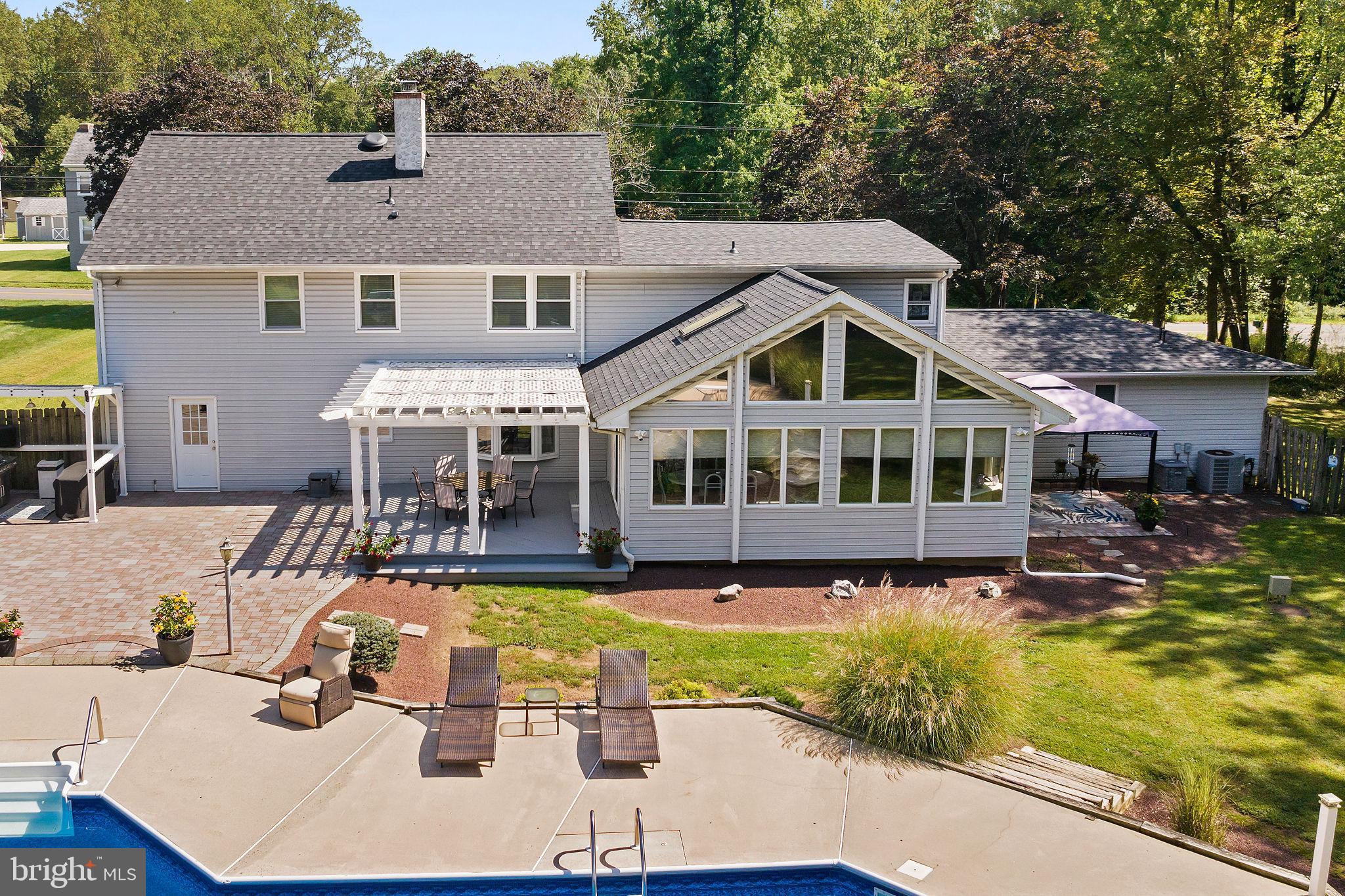 420 Extonville Road Allentown, NJ 08501 - Photo 8 of 57 a view of a house with swimming pool