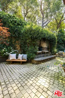 a view of a swimming pool with a lounge chair