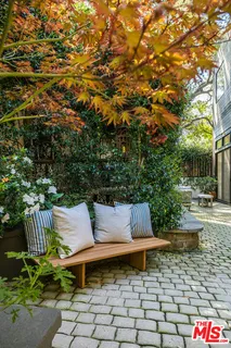a view of a bench in the patio