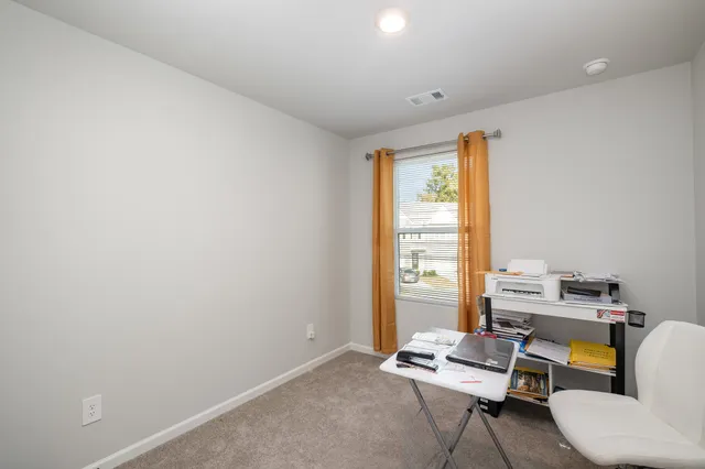 a room with furniture and a window