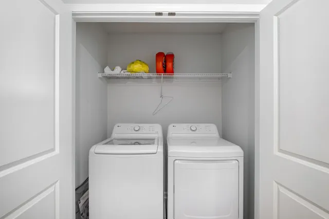 a utility room with dryer and washer