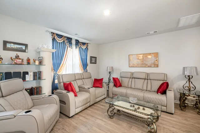 a living room with furniture and a couch