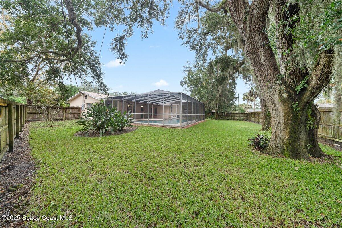 1438 Norbert Road Northeast Palm Bay, FL 32907 - Photo 6 of 23 Private Backyard