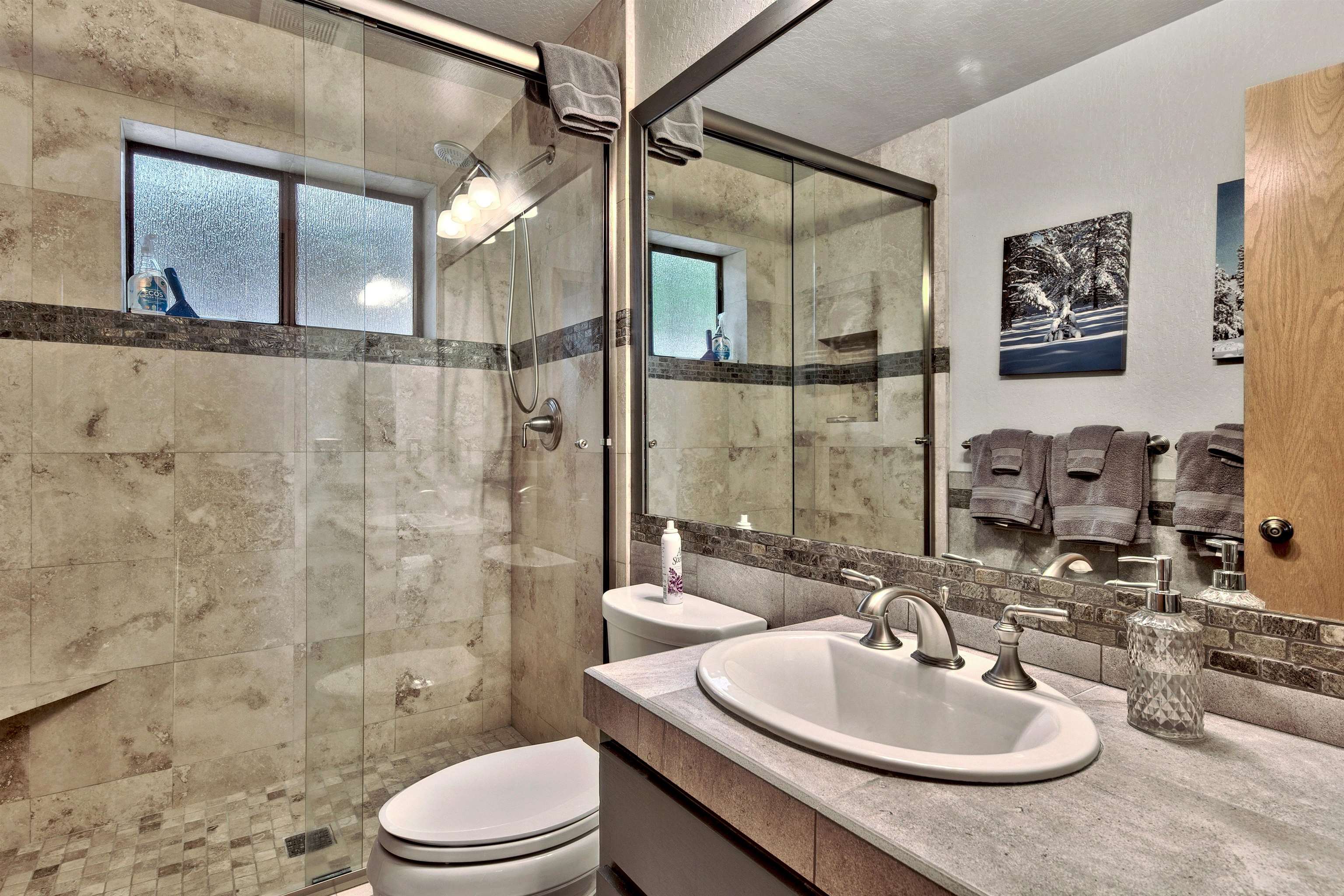 253 Basque Drive, Unit SHARE #7 Truckee, CA 96161 - Photo 12 of 21 a bathroom with a sink toilet and shower