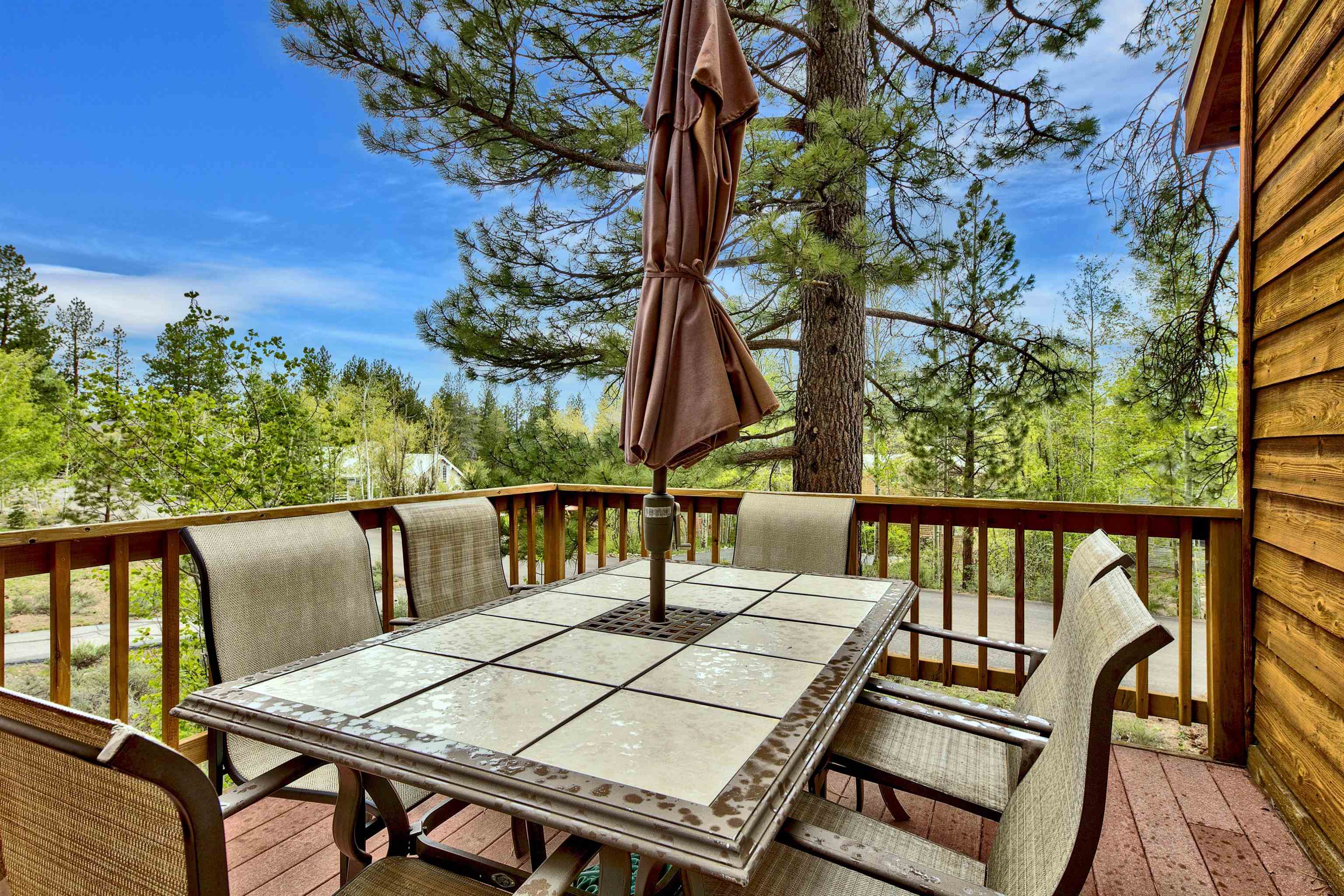 253 Basque Drive, Unit SHARE #7 Truckee, CA 96161 - Photo 14 of 21 a view of balcony with wooden floor and outdoor seating
