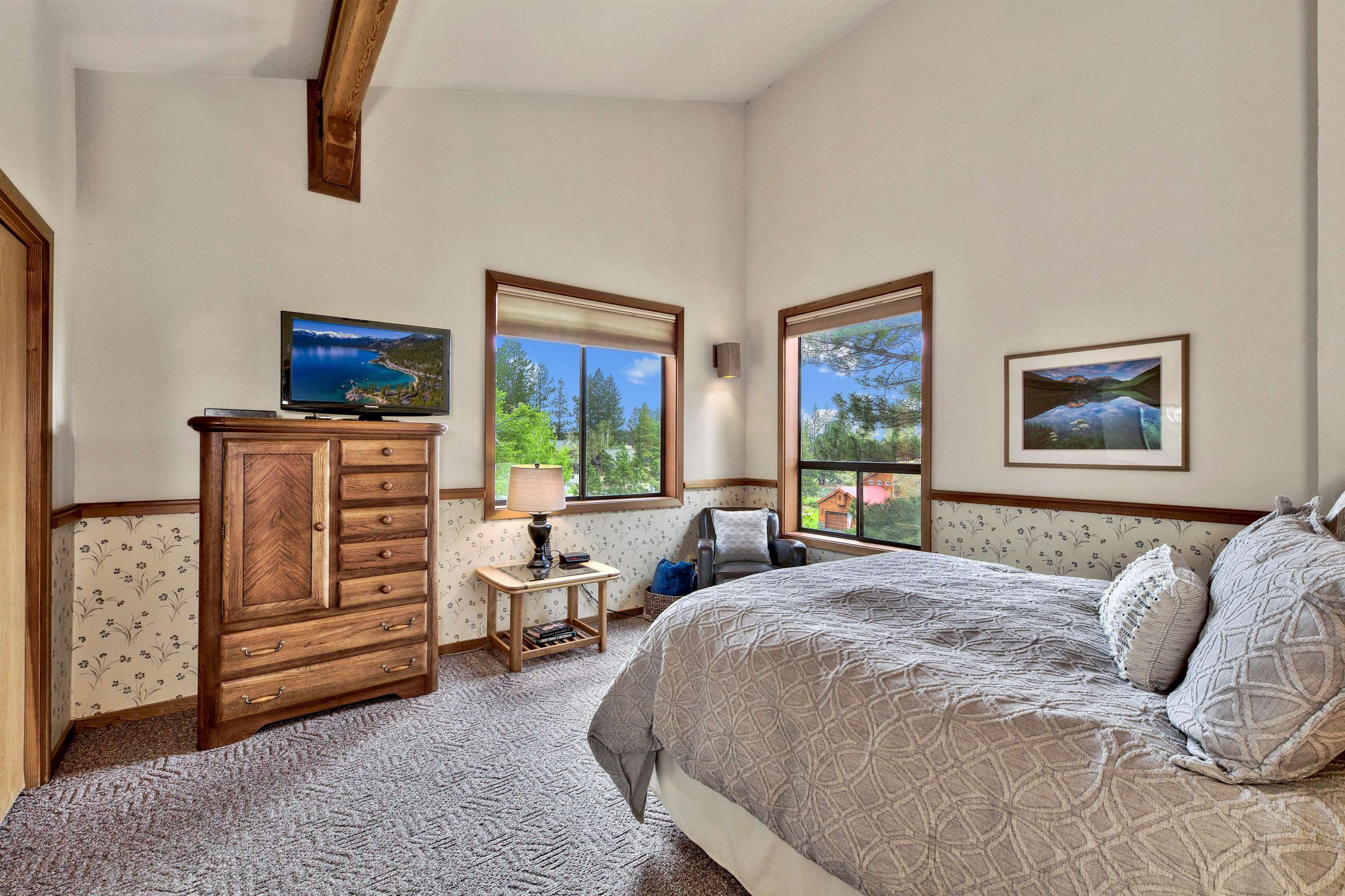 253 Basque Drive, Unit SHARE #7 Truckee, CA 96161 - Photo 9 of 21 a bedroom with a bed and wooden floor