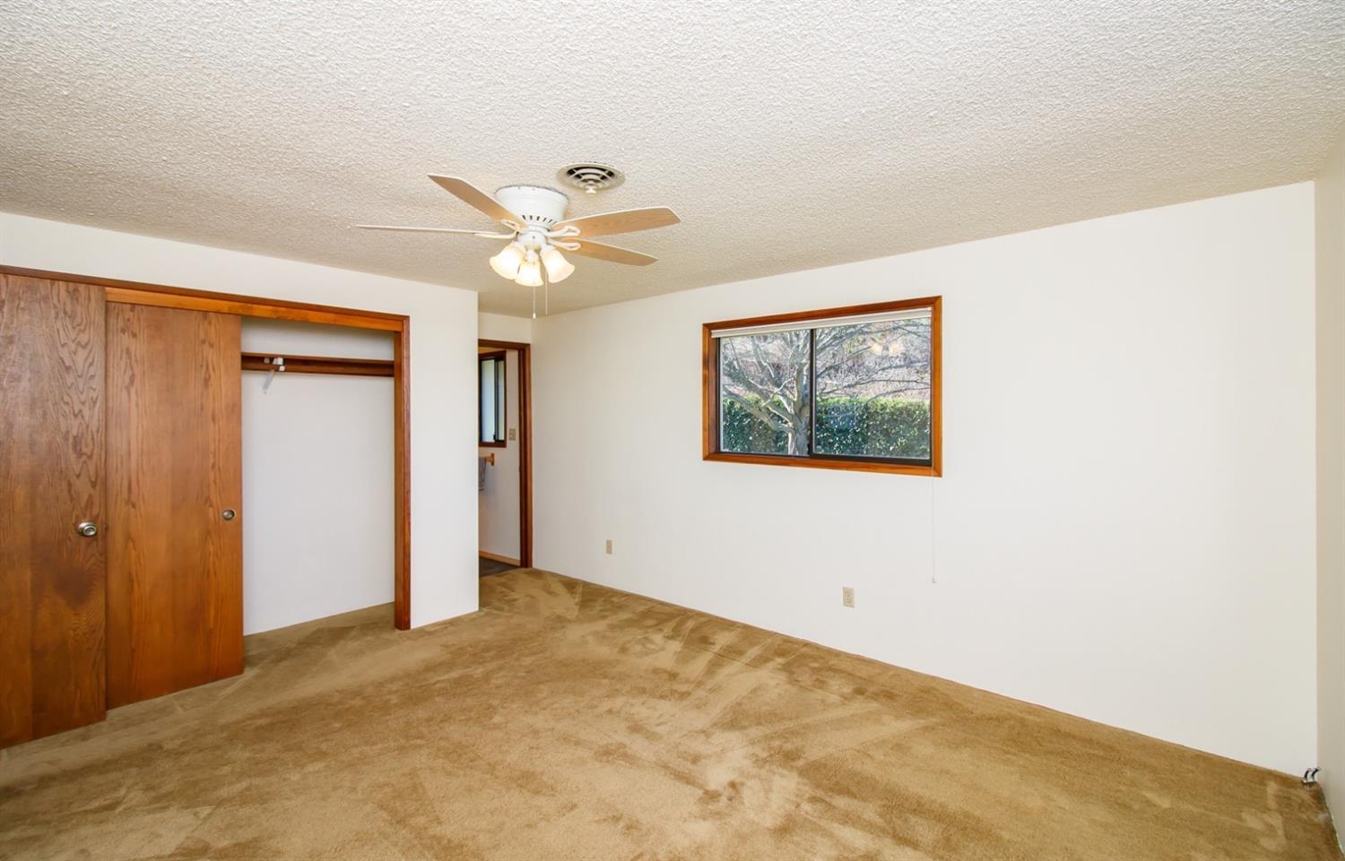 1257 Neil Creek Road Ashland, OR 97520 - Photo 22 of 34 Bedroom #2 with full en-suite bath