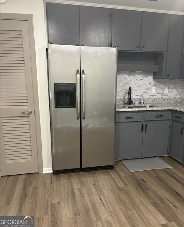 616 Fayetteville Road, Unit 616 & 618 Jonesboro, GA 30236 - Photo 5 of 14 a kitchen with stainless steel appliances a refrigerator and a sink