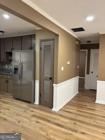 a view of a kitchen with a sink