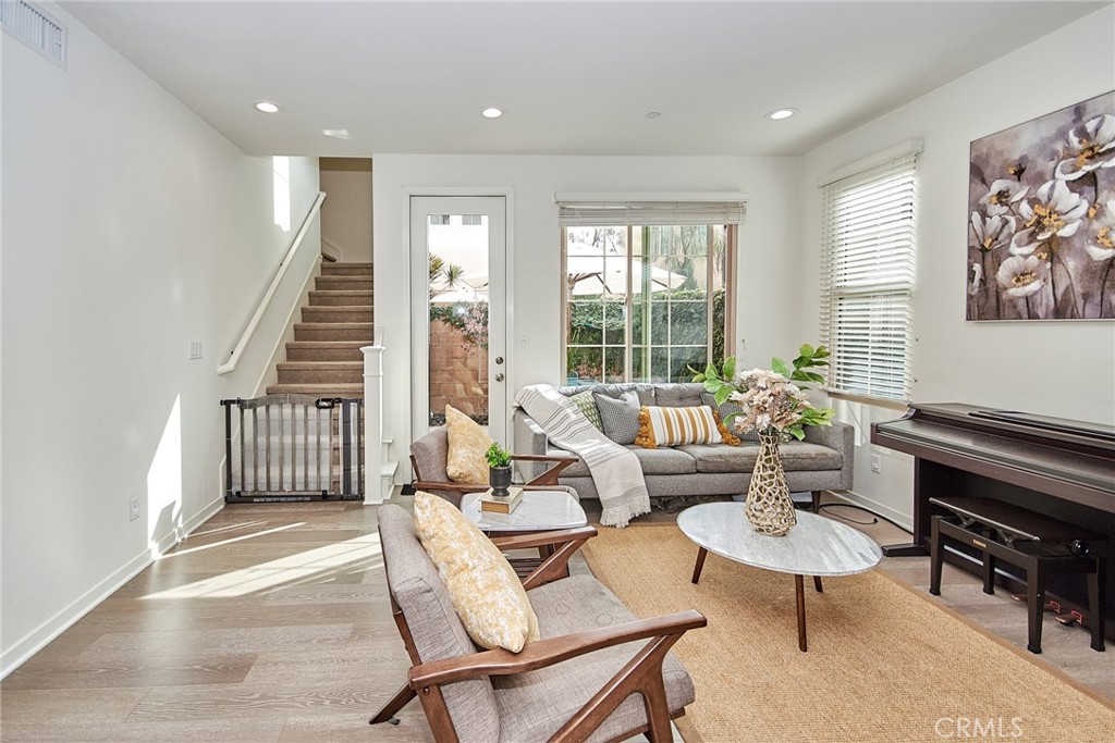 129 Excursion Irvine, CA 92618 - Photo 13 of 53 a living room with furniture and a window