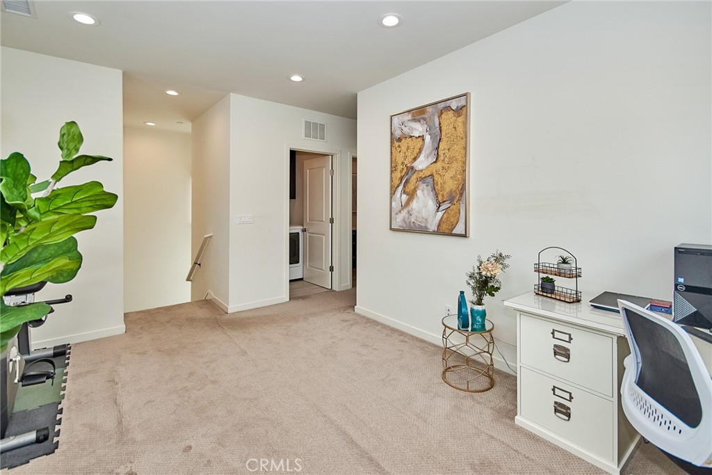 129 Excursion Irvine, CA 92618 - Photo 20 of 53 a view of room with workspace and natural light