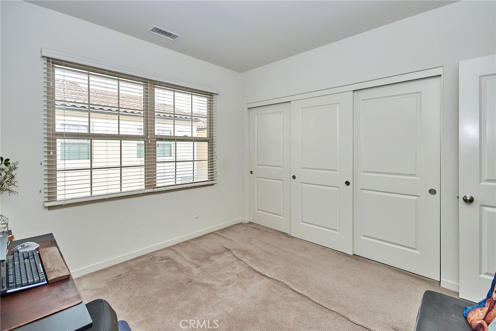 129 Excursion Irvine, CA 92618 - Photo 25 of 53 a view of an empty room with a window