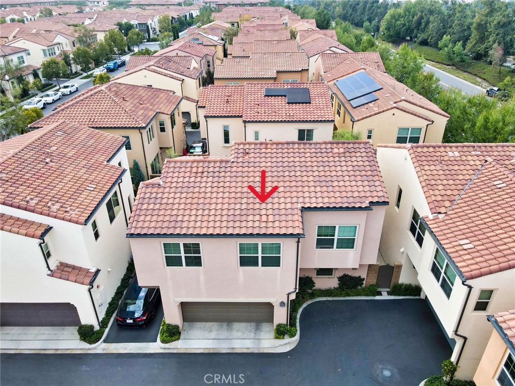 129 Excursion Irvine, CA 92618 - Photo 43 of 53 an aerial view of house with yard and staircase