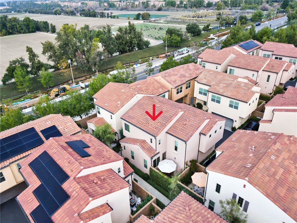 129 Excursion Irvine, CA 92618 - Photo 45 of 53 an aerial view of a house with a garden