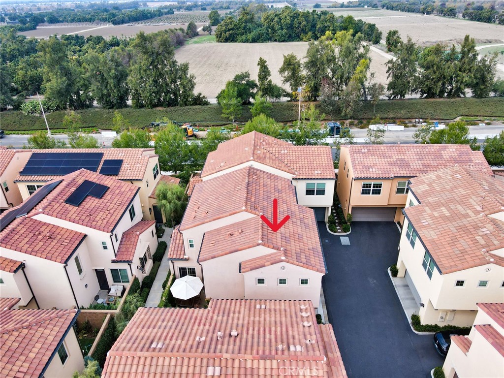 129 Excursion Irvine, CA 92618 - Photo 46 of 53 an aerial view of houses with yard