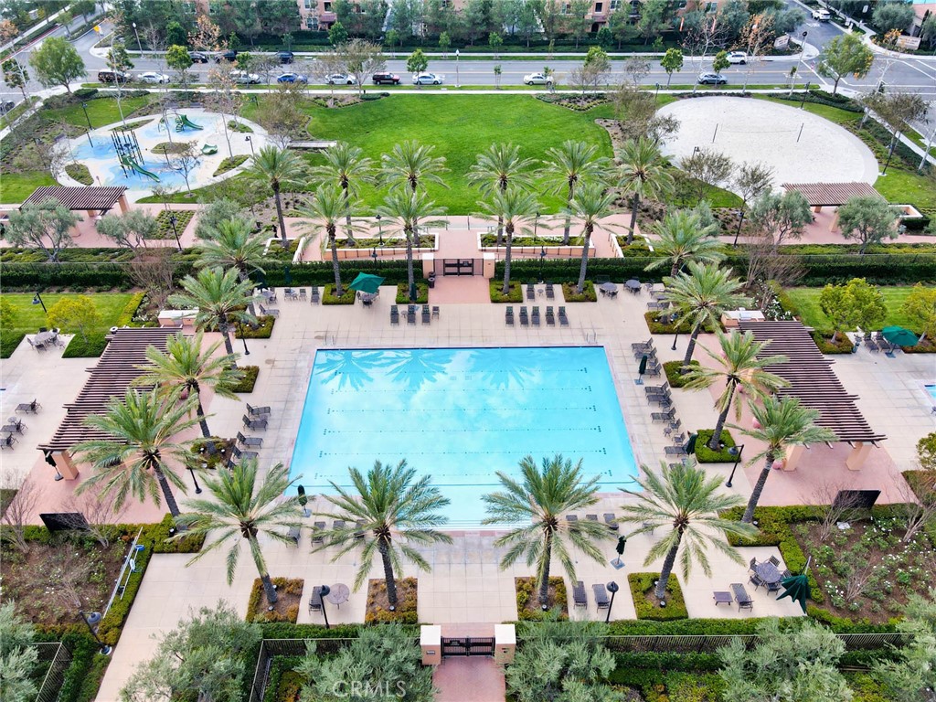129 Excursion Irvine, CA 92618 - Photo 47 of 53 a view of a swimming pool and outside seating area