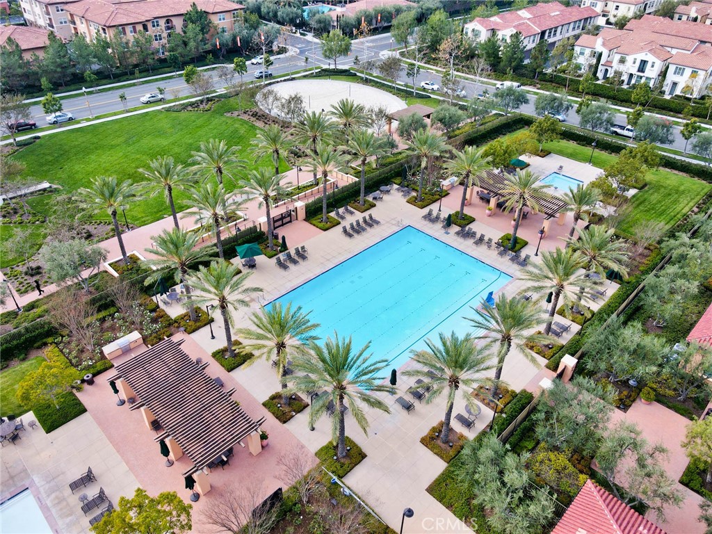 129 Excursion Irvine, CA 92618 - Photo 48 of 53 an aerial view of a house with a garden and swimming pool