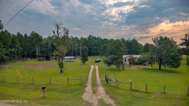 a view of a golf course with chairs