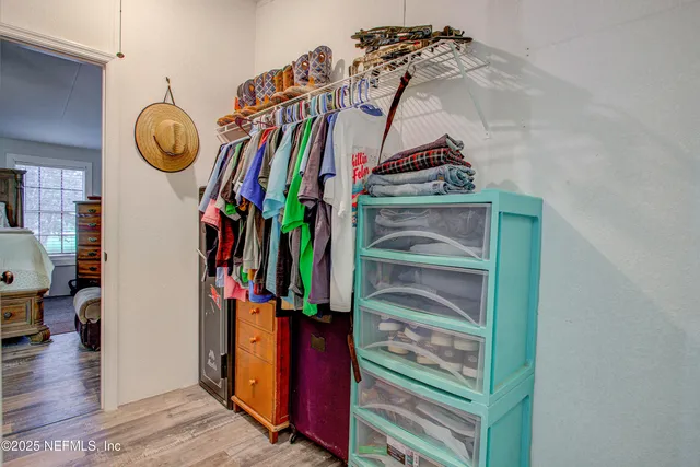 a bathroom with a granite countertop toilet a sink and bathtub