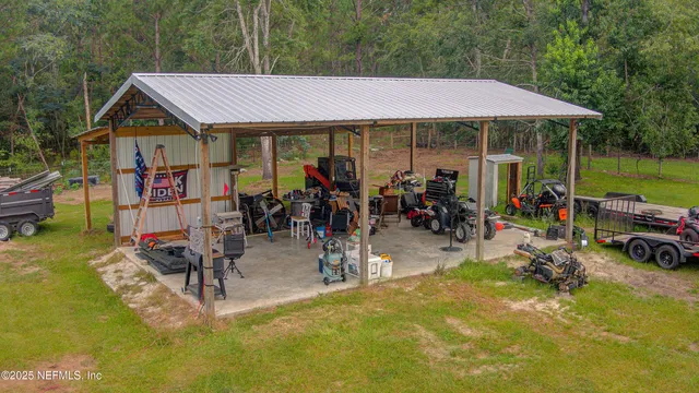 a view of a chairs and table in patio of a house