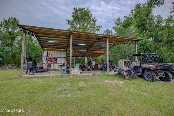 a view of a swimming pool and an outdoor space