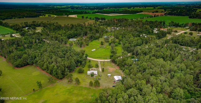 a bathroom with a toilet sink and shower