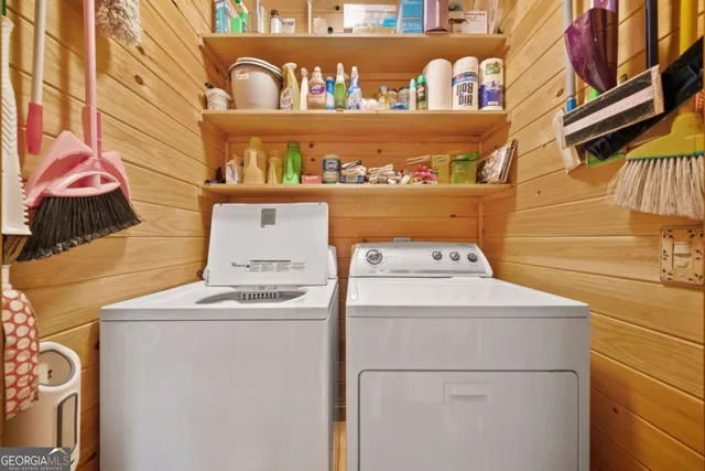 a utility room with dryer and washer