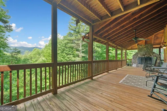 a view of backyard with a patio