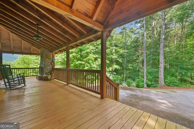 a view of porch with wooden floor in outdoor space