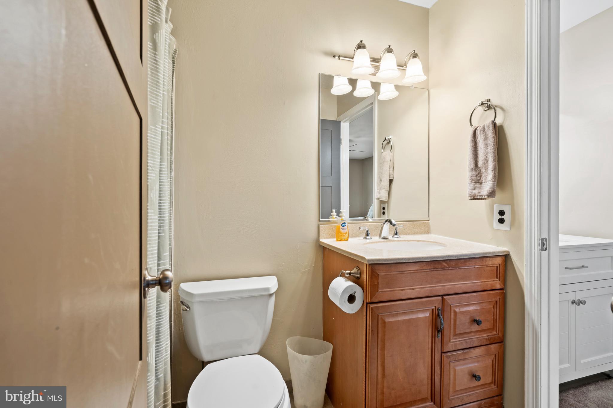 110 Rutledge Court North Wales, PA 19454 - Photo 17 of 35 a bathroom with a sink a toilet and mirror