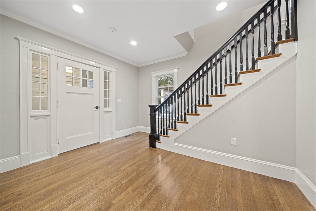 53 Highland Avenue Arlington, MA 02476 - Photo 15 of 34 a view of an entryway with wooden floor