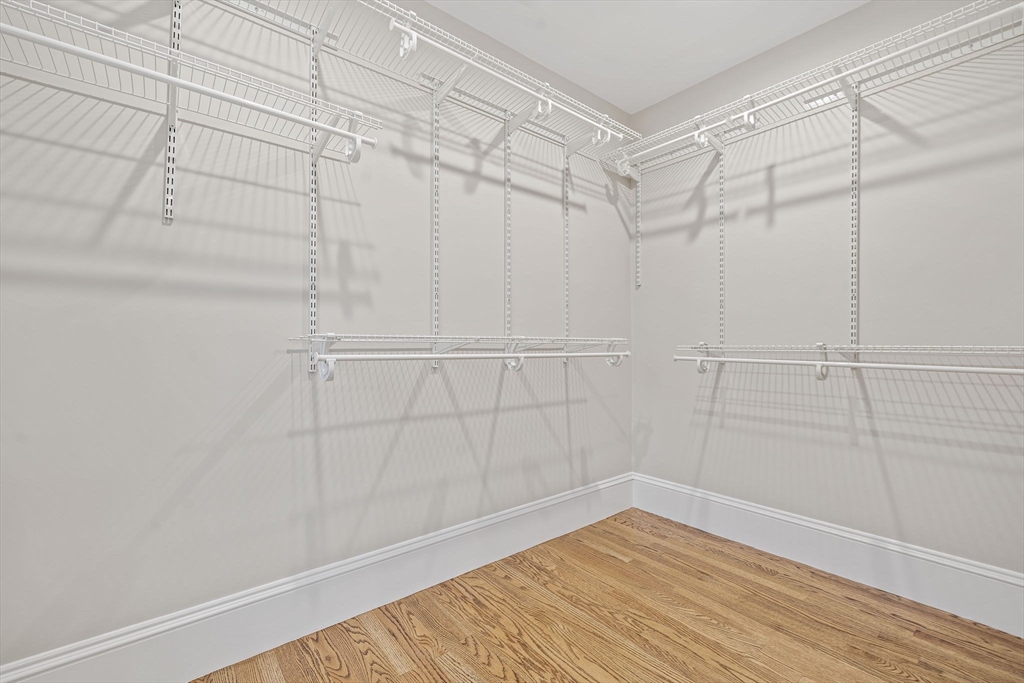 53 Highland Avenue Arlington, MA 02476 - Photo 21 of 34 a view of a room with racks on the wall