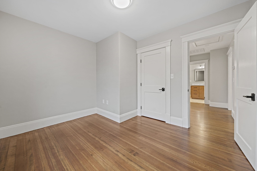 53 Highland Avenue Arlington, MA 02476 - Photo 24 of 34 wooden floor in an empty room