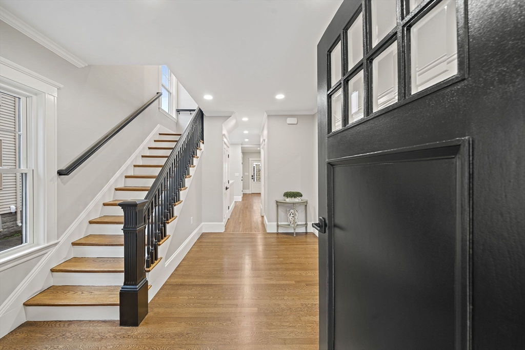 53 Highland Avenue Arlington, MA 02476 - Photo 4 of 34 a view of entryway and hall with wooden floor