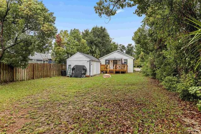 a house view with a garden space