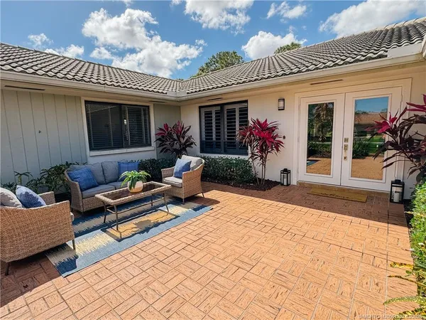 a bed room with a bed and a mirror