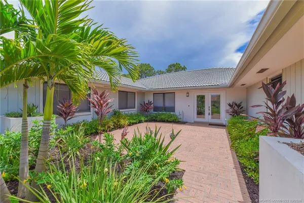 a view of an outdoor space and tennis court