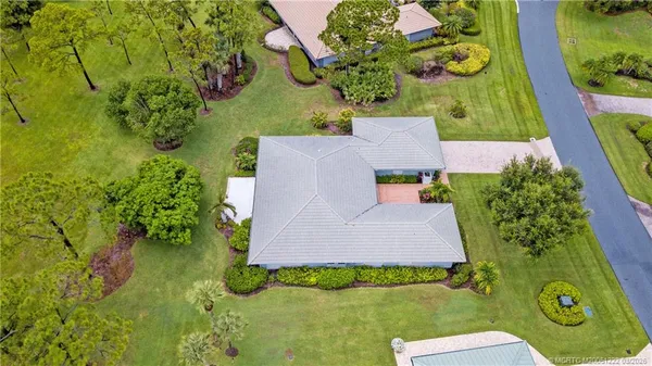a view of a park with large trees