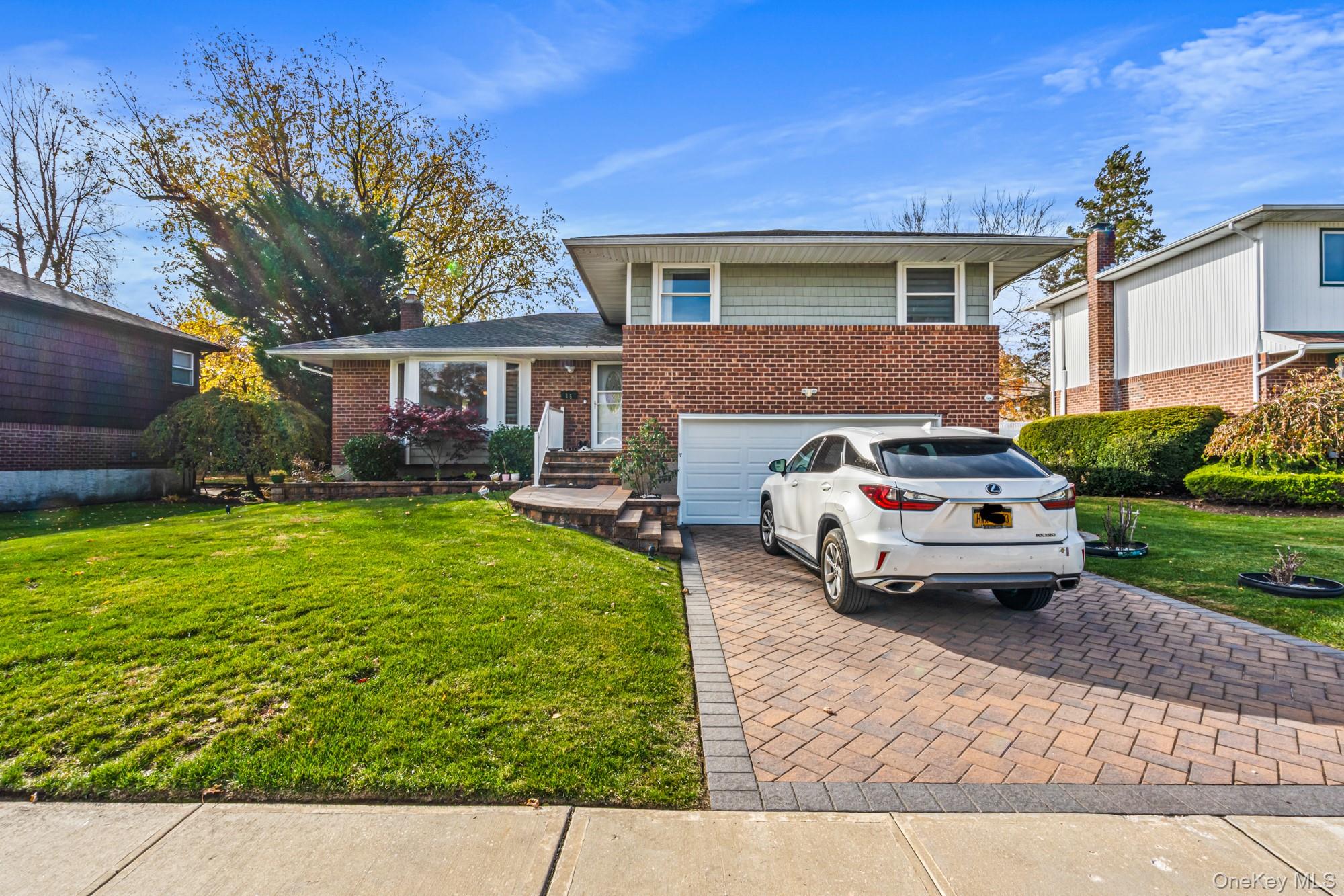 a car parked in front of a house