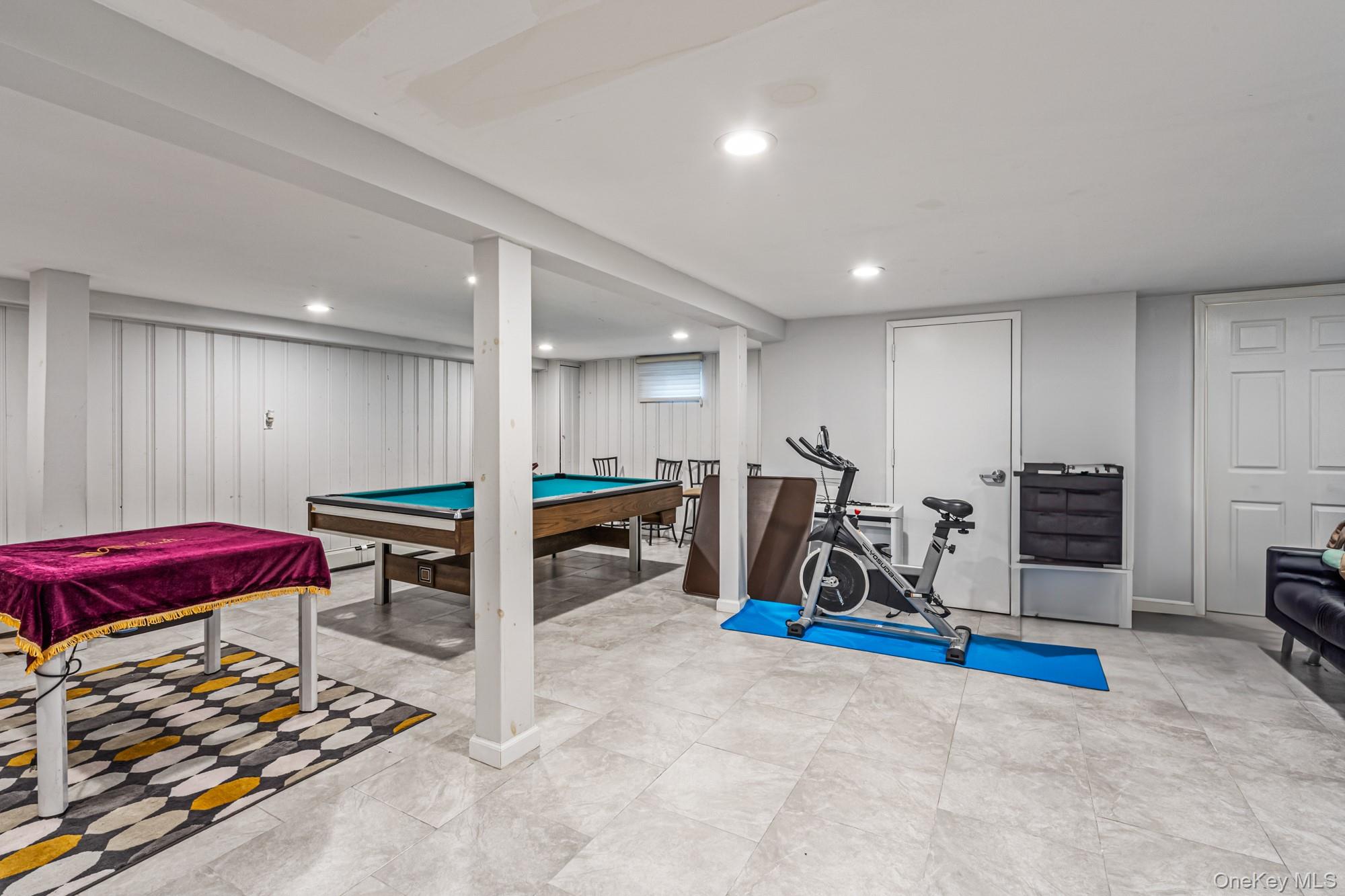 15 Vista Road Plainview, NY 11803 - Photo 22 of 26 a view of a room with gym equipment