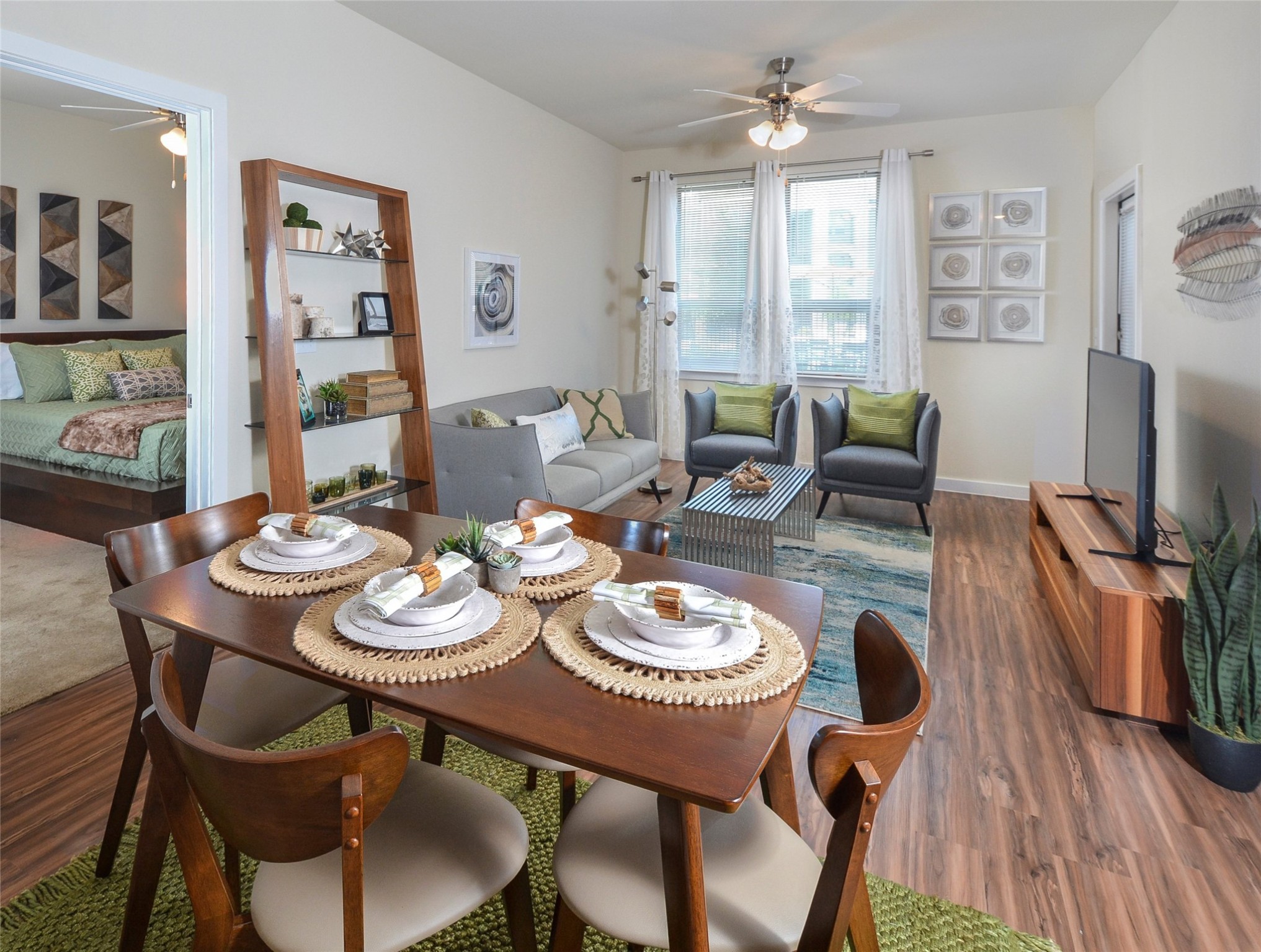 10148 Culebra Road San Antonio, TX 78251 - Photo 13 of 15 a dining room with furniture a window and wooden floor
