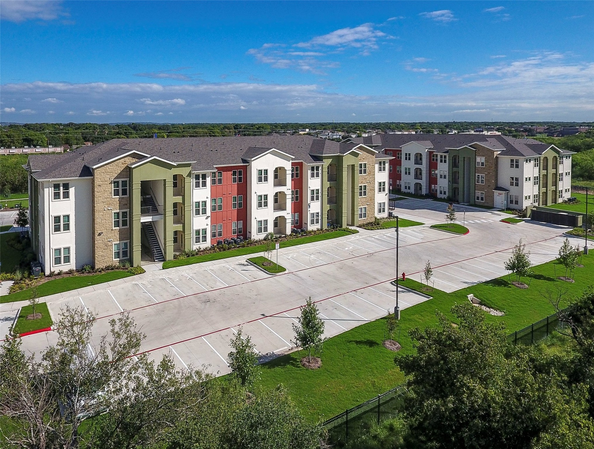 10148 Culebra Road San Antonio, TX 78251 - Photo 8 of 15 a front view of a house with a yard and potted plants