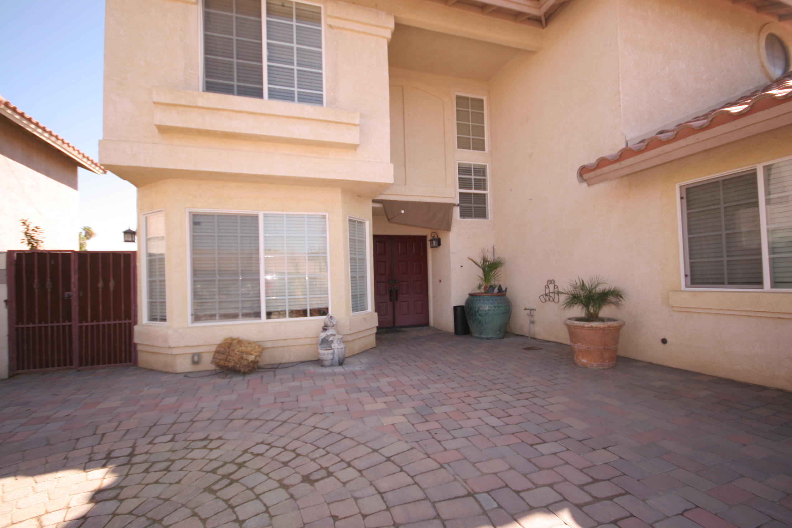 45736 Sutter Creek Road Indio, CA 92201 - Photo 3 of 44 a view of a house with backyard and a porch