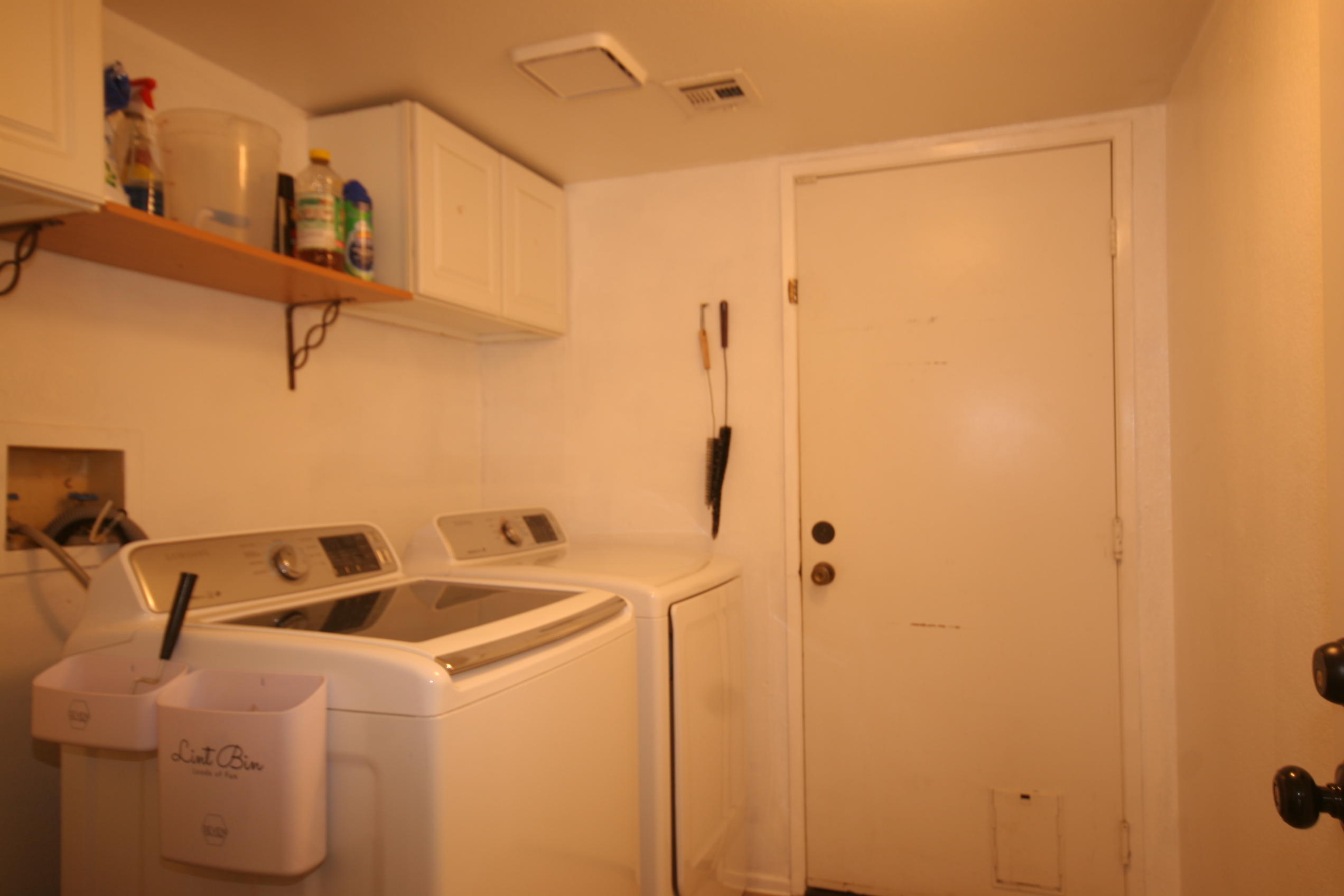 45736 Sutter Creek Road Indio, CA 92201 - Photo 23 of 44 a utility room with dryer and washer