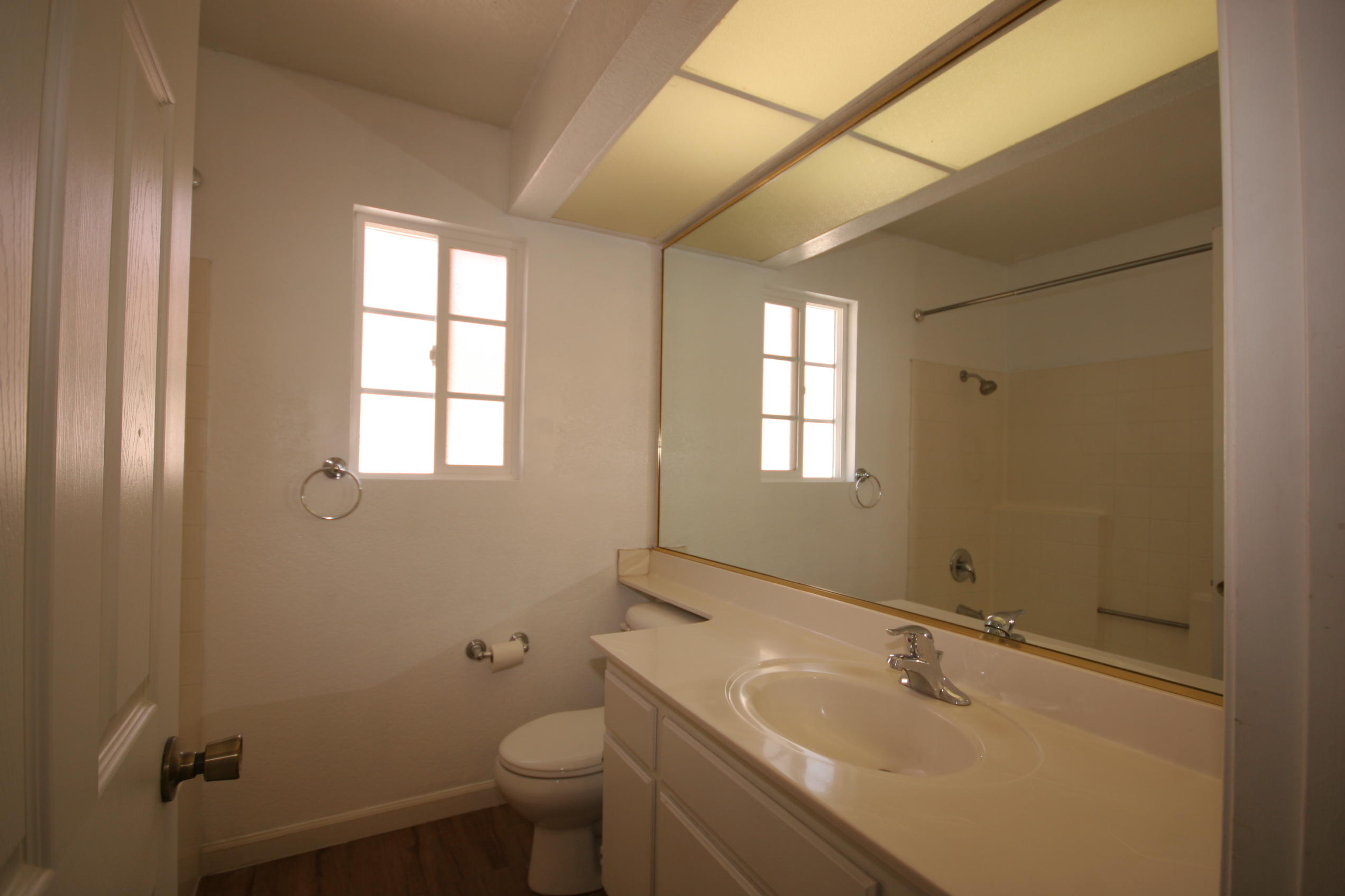 45736 Sutter Creek Road Indio, CA 92201 - Photo 29 of 44 a bathroom with a sink toilet and window