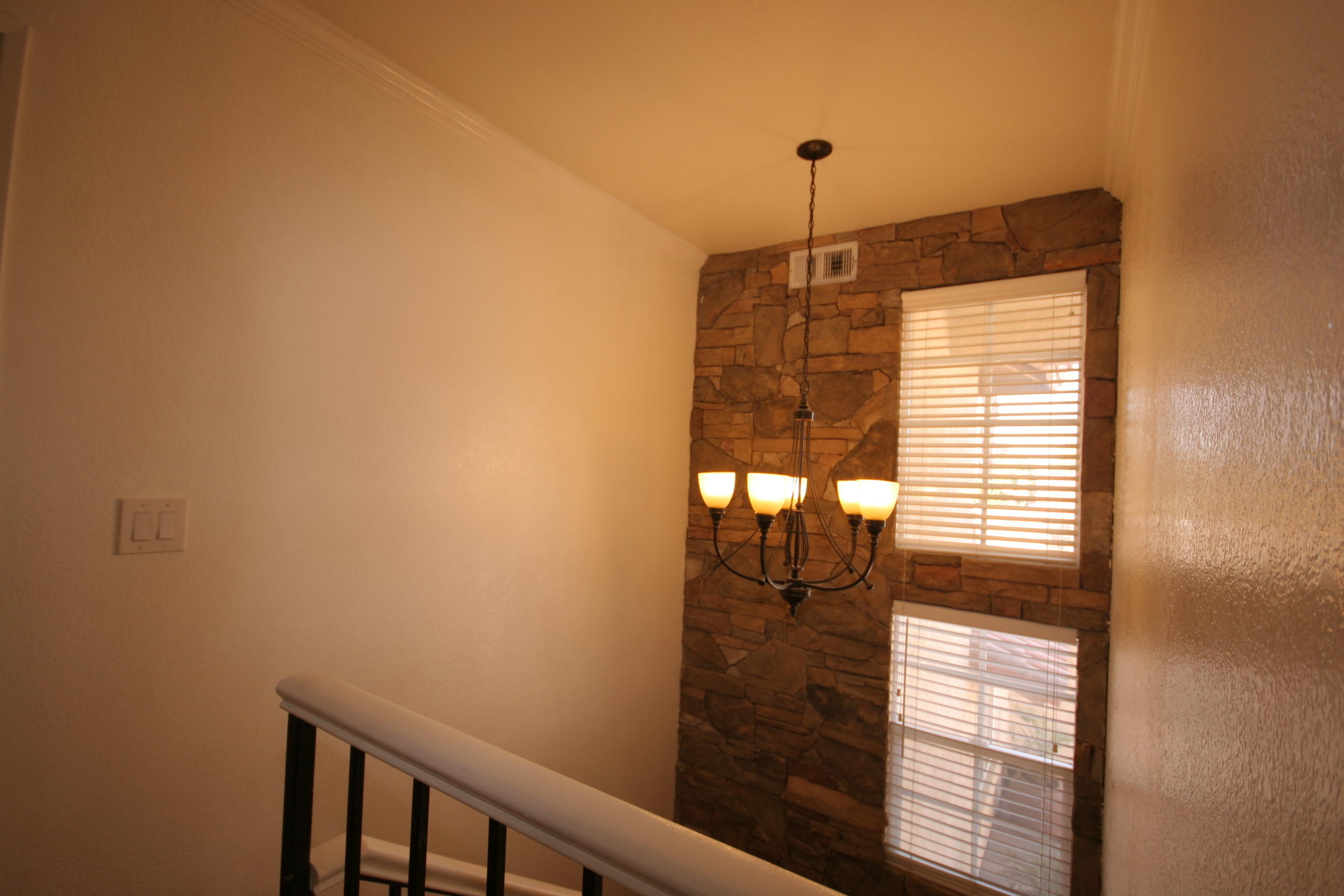 45736 Sutter Creek Road Indio, CA 92201 - Photo 38 of 44 a view of entryway and hall with wooden floor