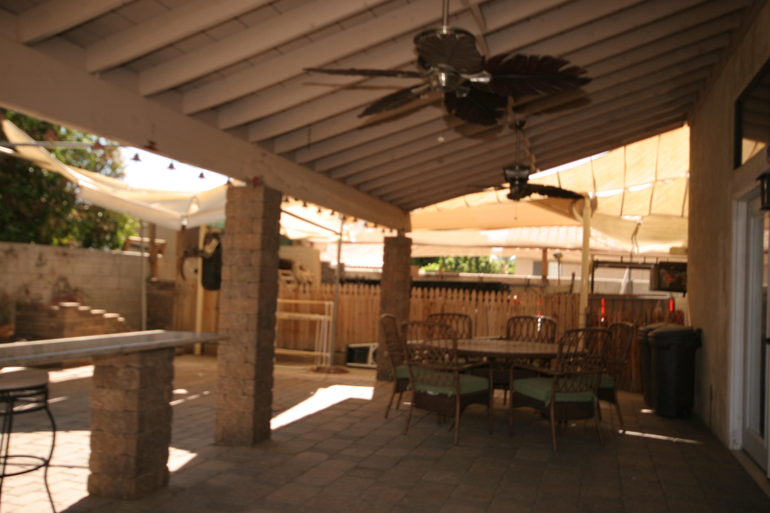 45736 Sutter Creek Road Indio, CA 92201 - Photo 44 of 44 a view of a porch with furniture and next to yard