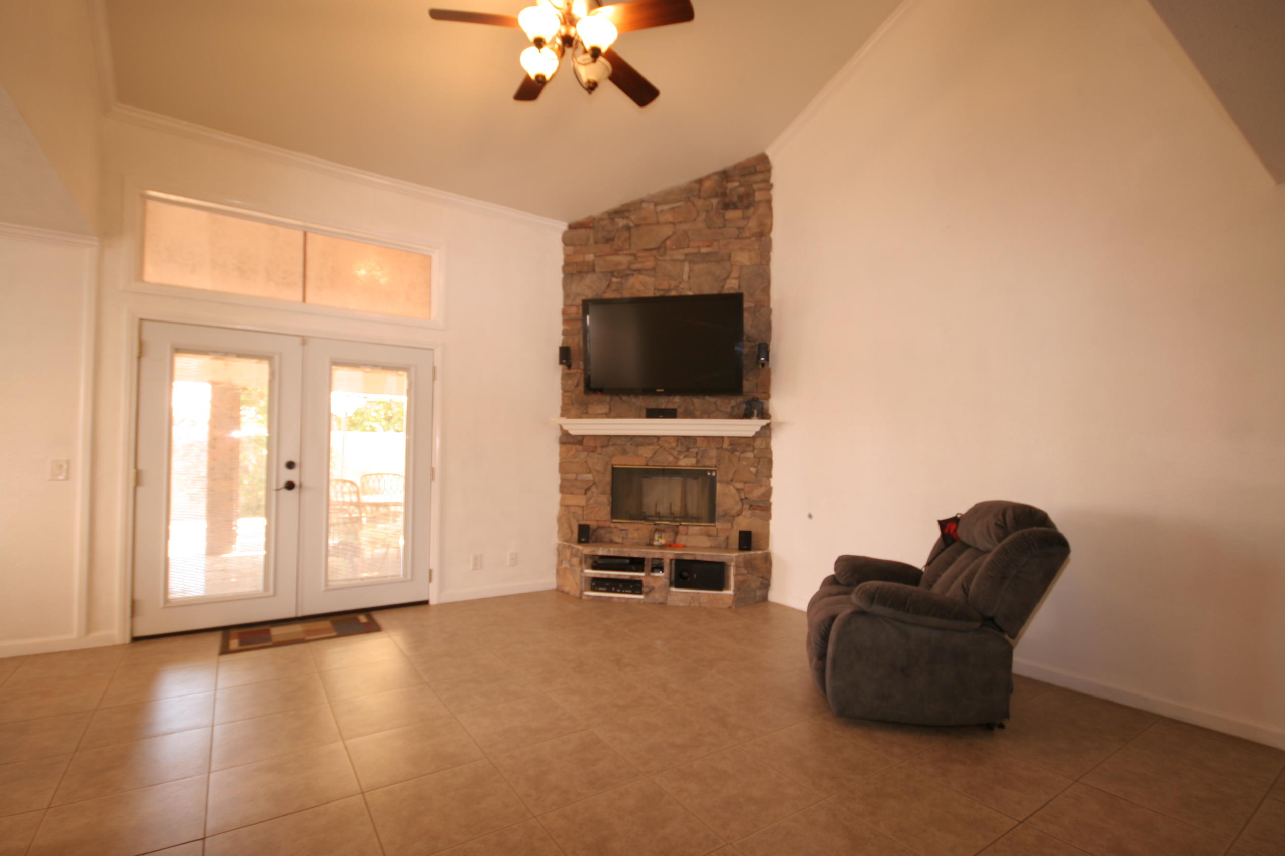 45736 Sutter Creek Road Indio, CA 92201 - Photo 8 of 44 a living room with furniture and a flat screen tv